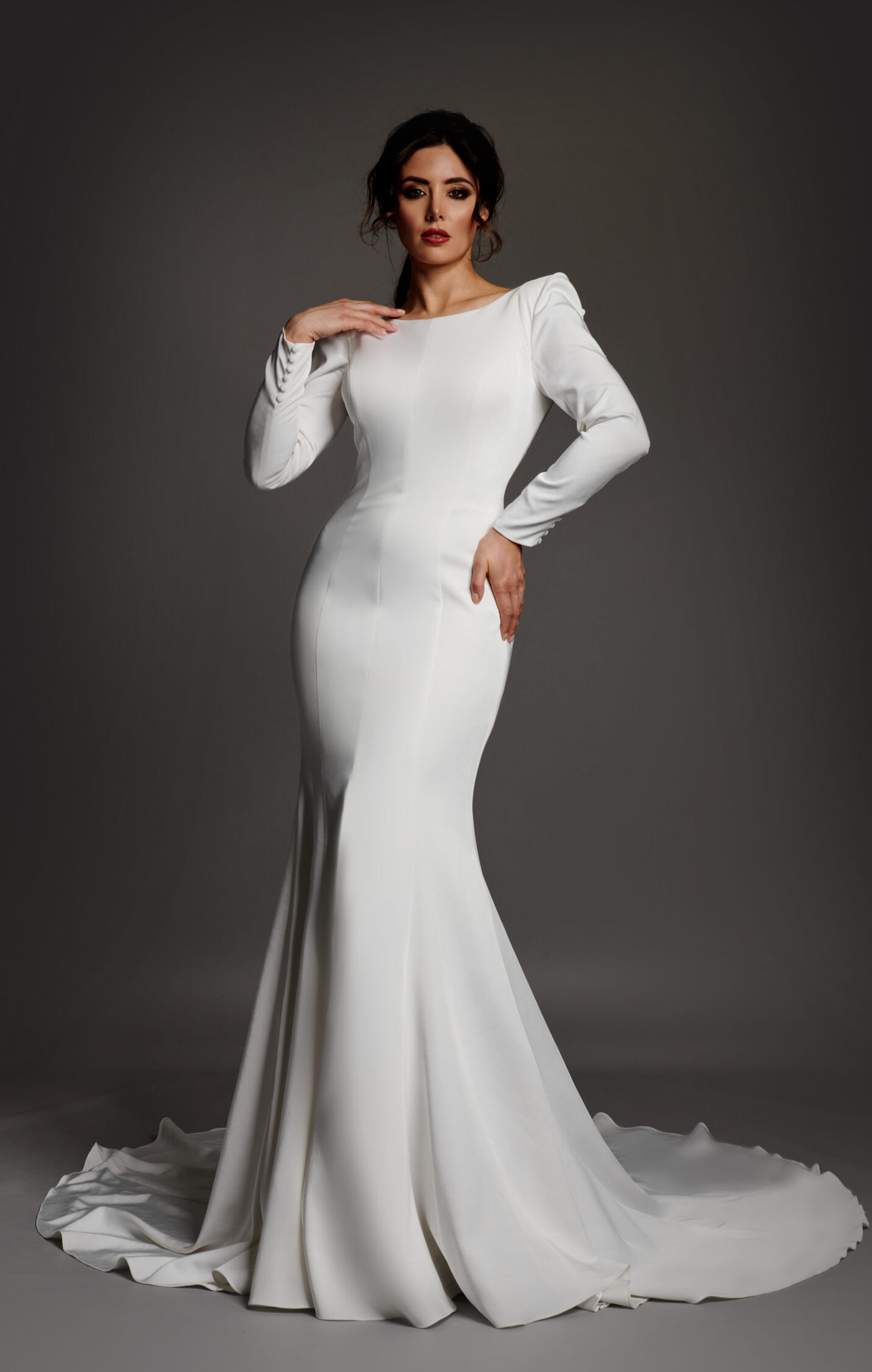 Contemporary crepe halter neck wedding dress with contrast velvet belt