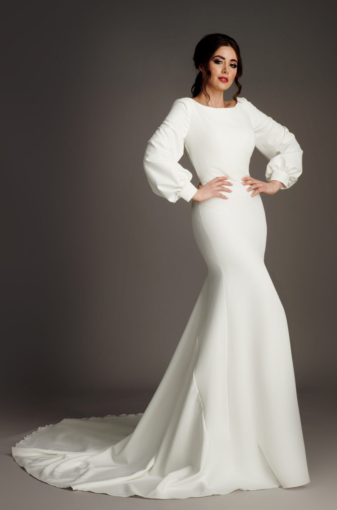 Contemporary crepe halter neck wedding dress with contrast velvet belt