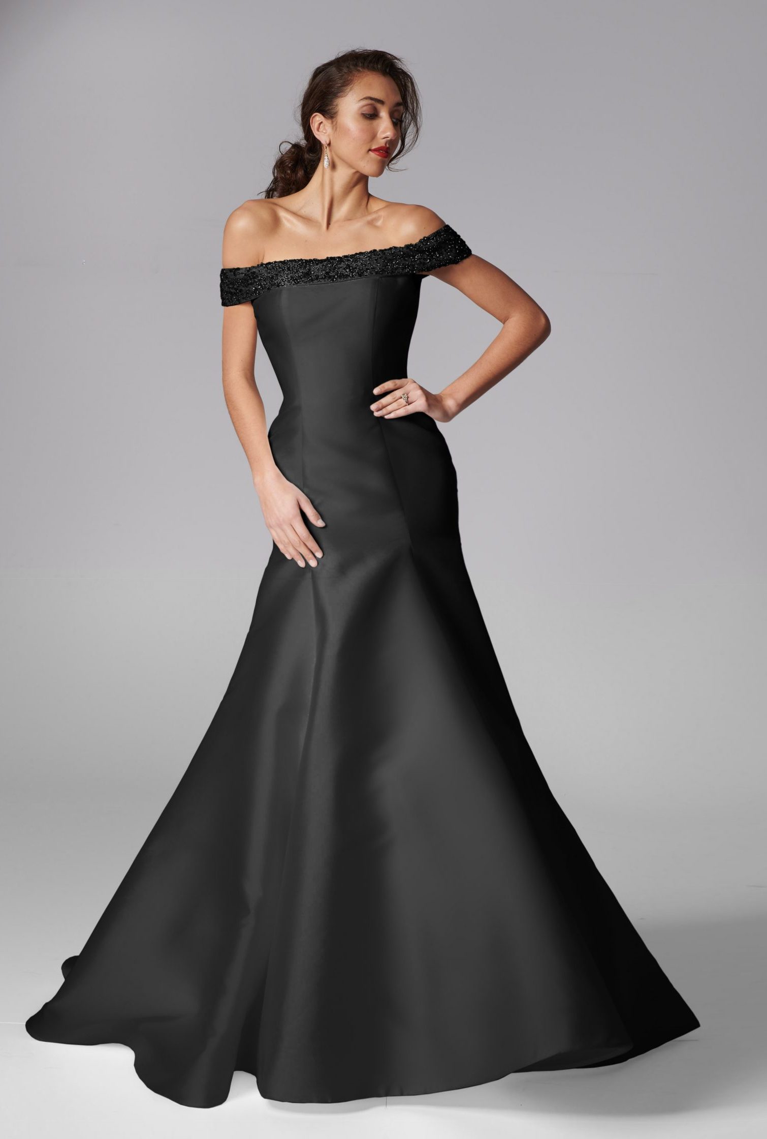 Luxurious mikado satin gothic black wedding dress with lace detail and pleats
