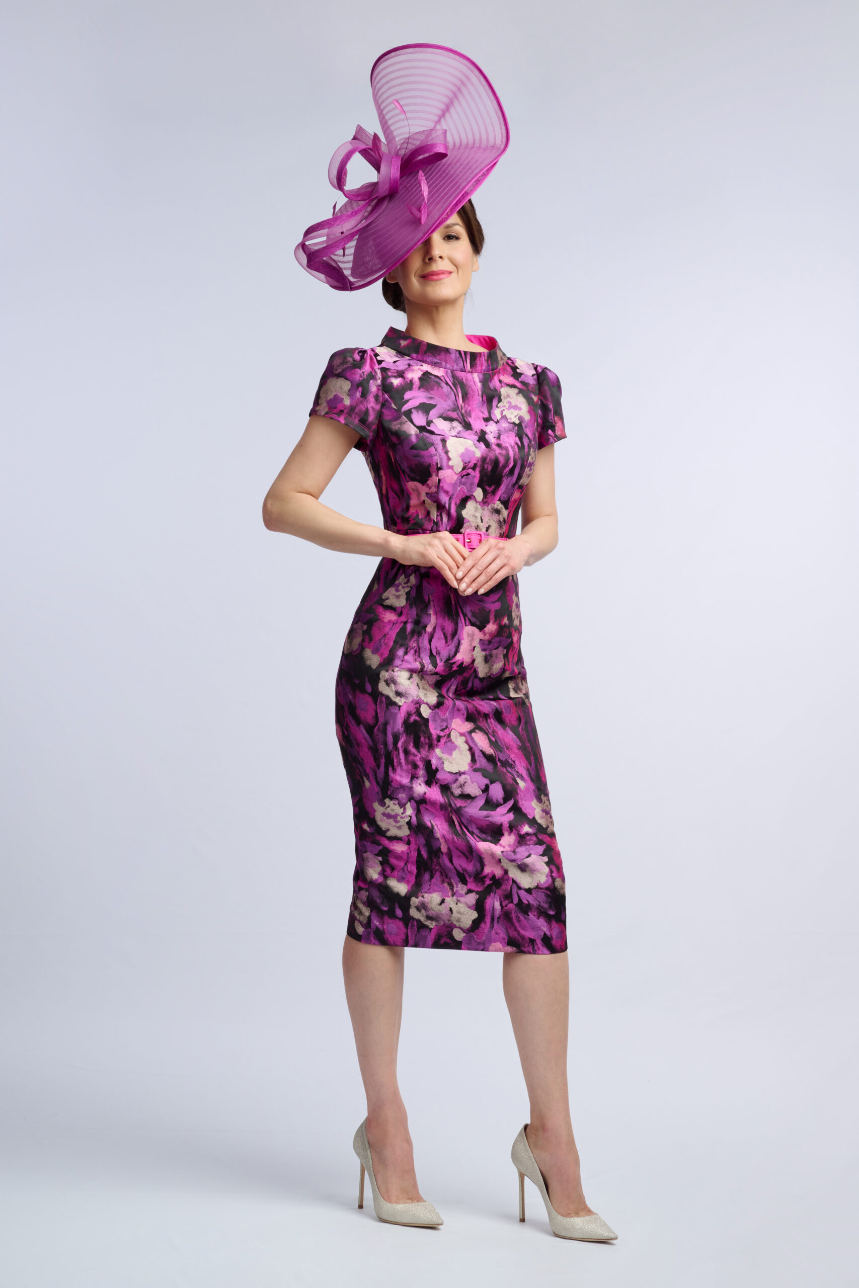 Side-angled view of the Chester floral occasion dress showing its collar detail and fitted silhouette