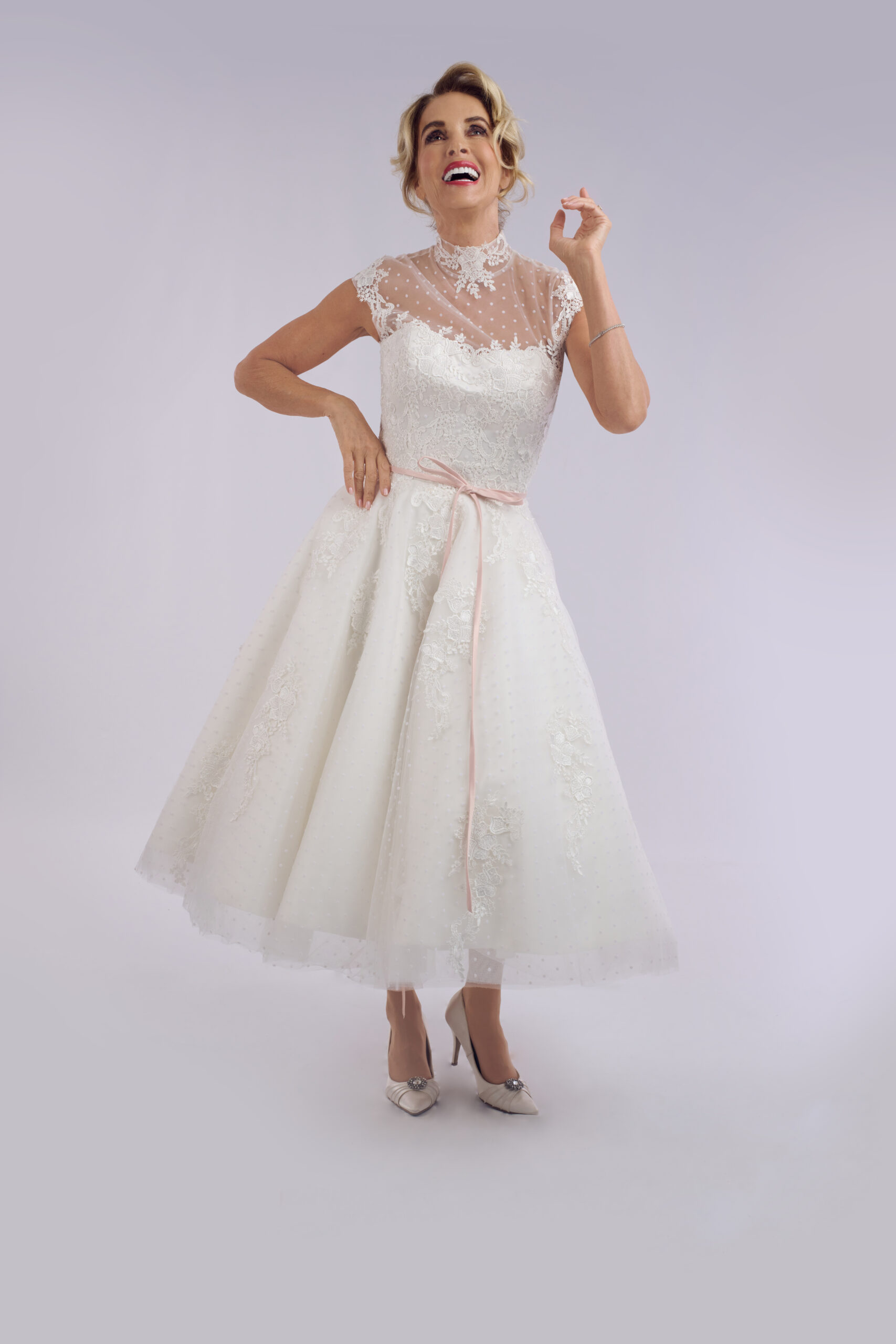 Bonnie high neck lace tea length wedding dress for older brides, with an illusion neckline and full spot tulle skirt