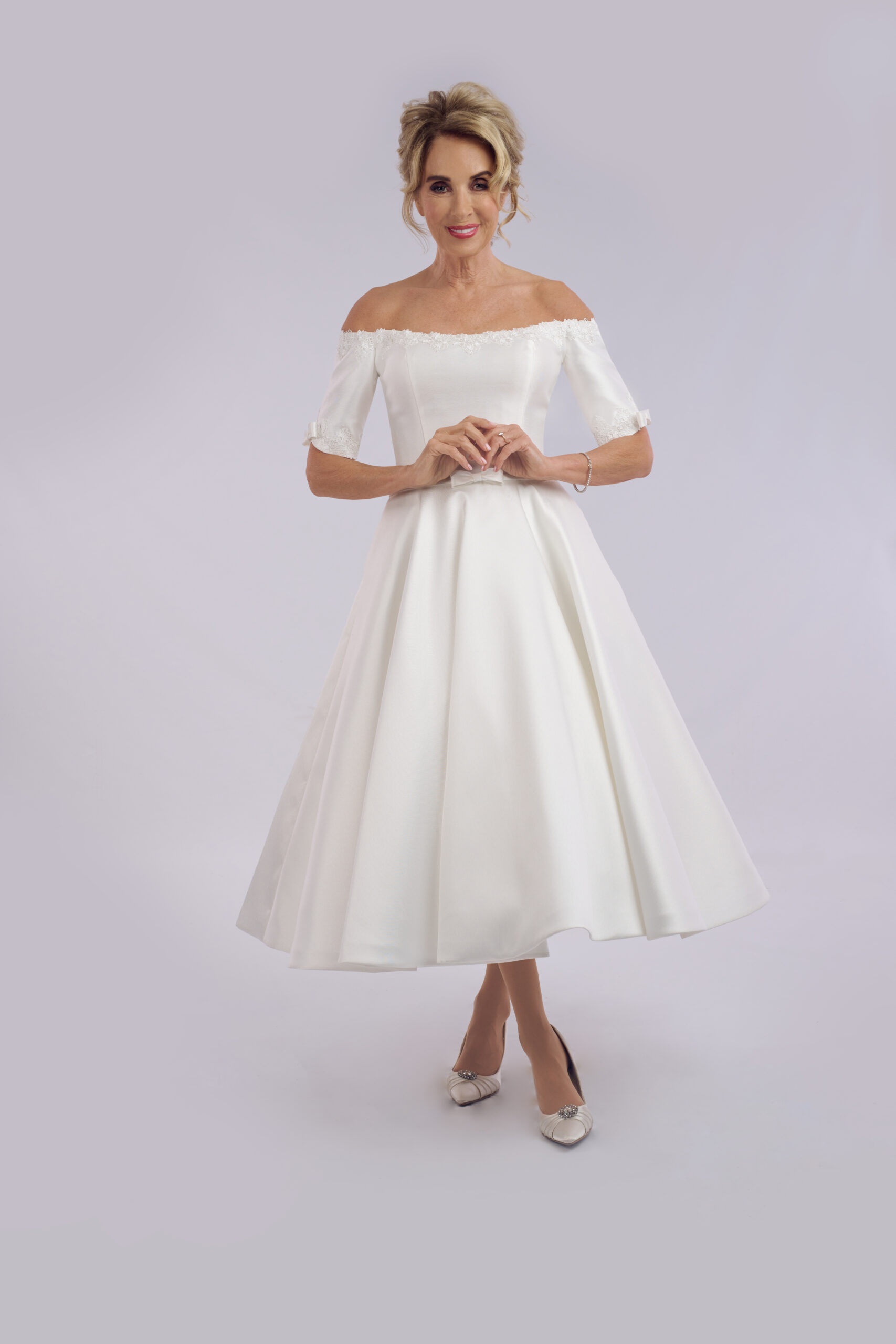 Coco off-the-shoulder satin ballerina length wedding dress for older brides, with short sleeves and a full skirt